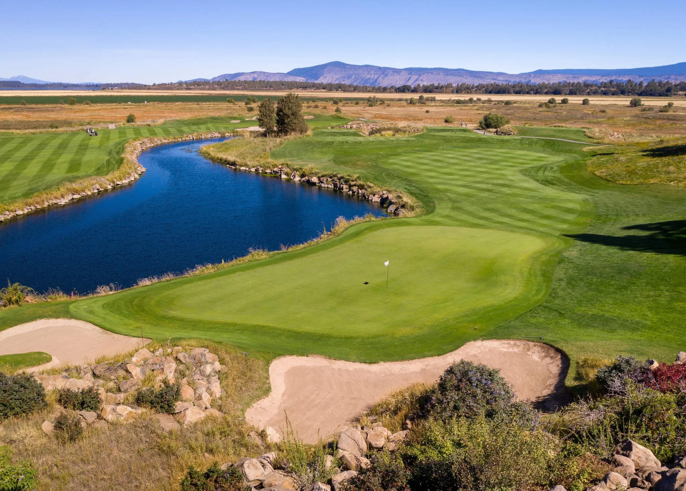 Gorgeous view of a golf course with a water hazard at Running Y Resort in Oregon.